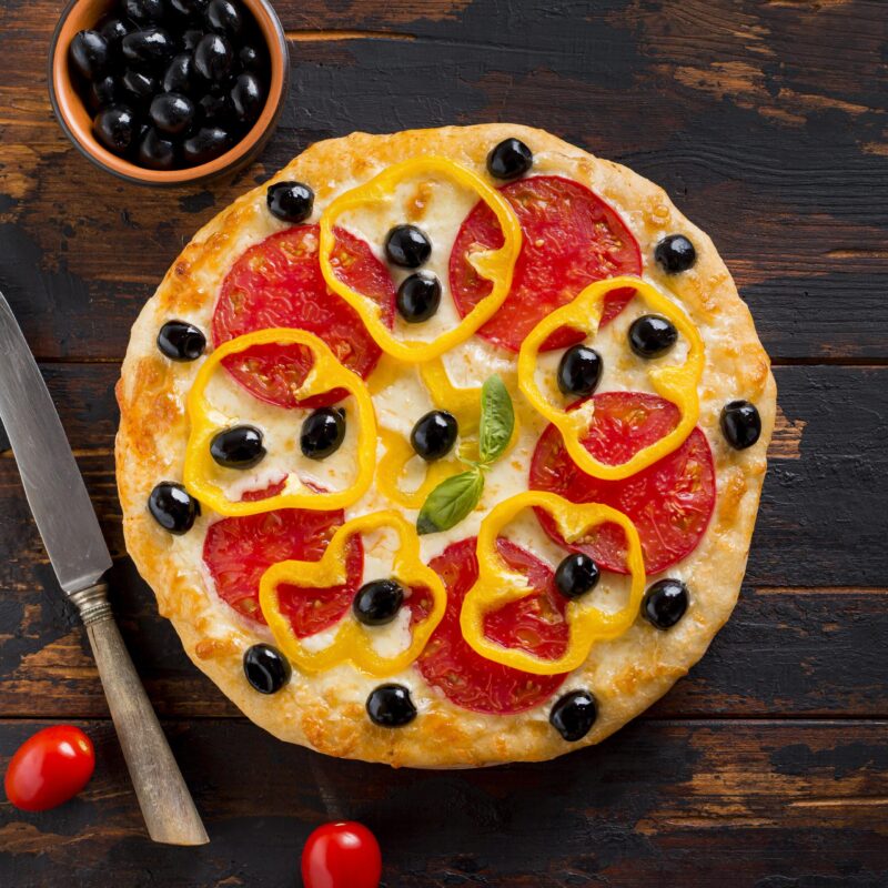 flat-lay-delicious-pizza-wooden-table
