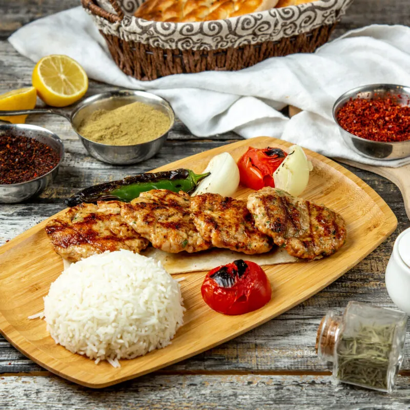 fried-chicken-cutlets-rice-tomato-side-view-scaled-300x300