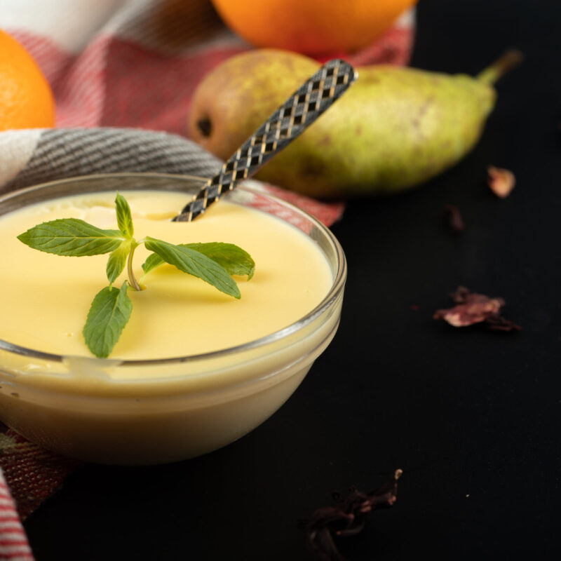 Milky pudding with mint and fresh fruits