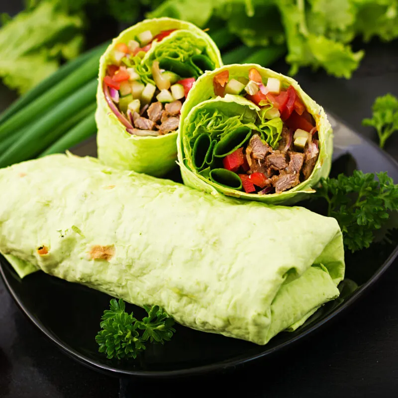 shawarma-from-juicy-beef-lettuce-tomatoes-cucumbers-paprika-onion-pita-bread-with-spinach-diet-menu-scaled-300x300