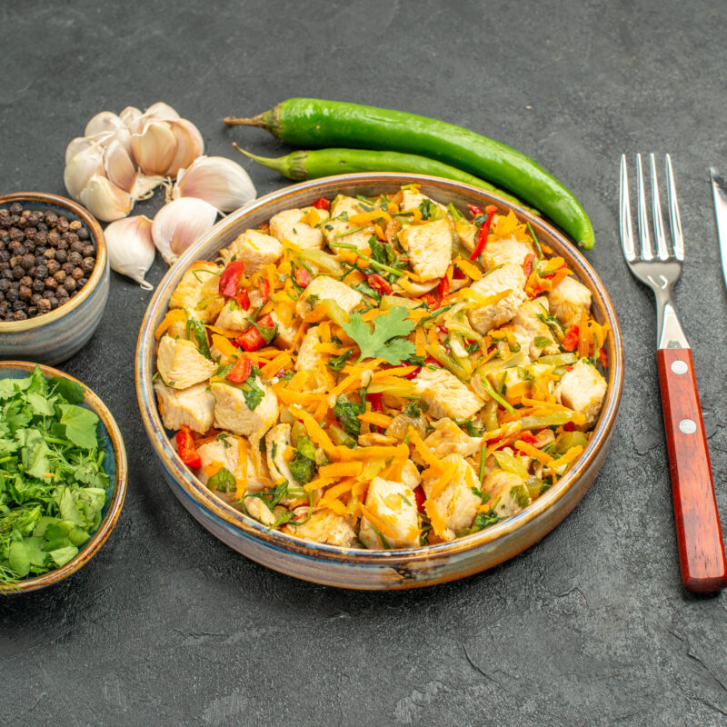 top-view-tasty-chicken-salad-with-vegetables