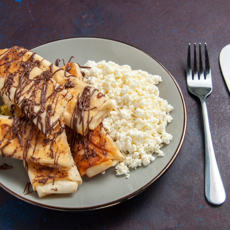 top-view-yummy-sweet-pastries-sliced-with-cottage-cheese-dark-background-cookie-biscuit-sugar-sweet-cake