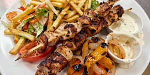 freepik__chicken-kebab-with-fries-charred-bell-peppers-and-__98967